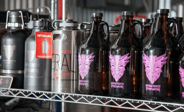 Line up of growlers and other branded water bottles